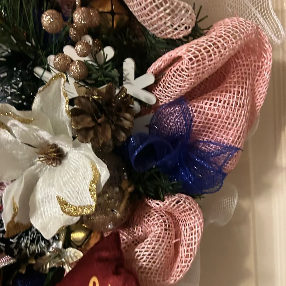 Festive Holiday Wreath with Pink and Gold Accents